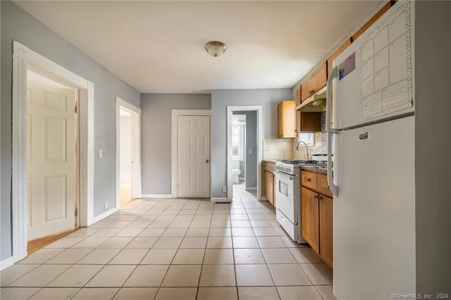 a view of a kitchen with kitchen