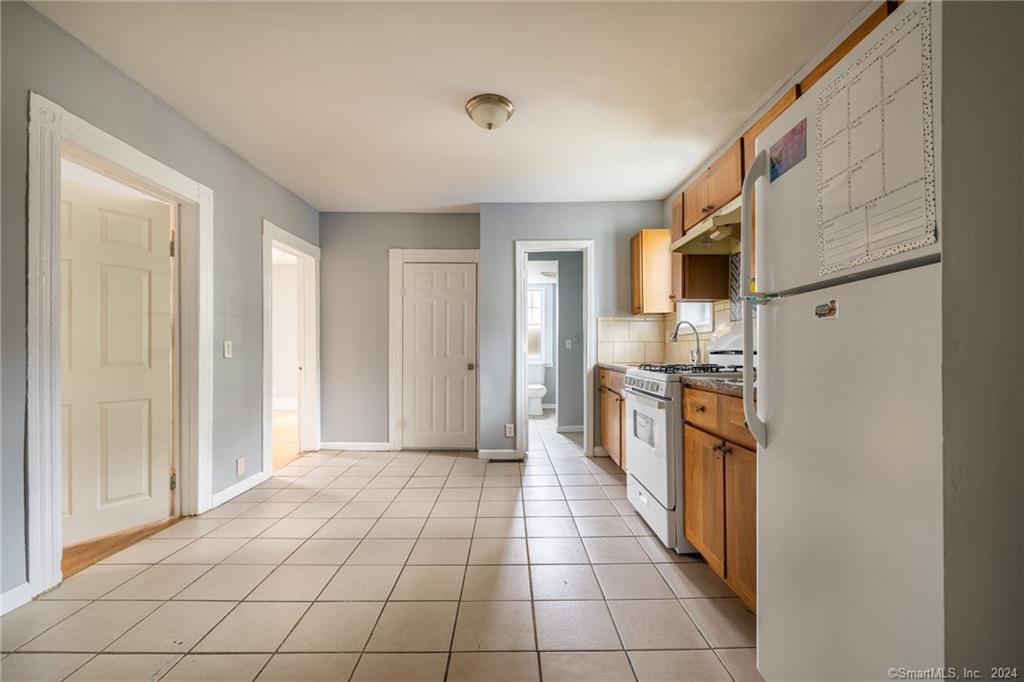 26 Pleasant Street Bridgeport, CT 06608 - Photo 4 of 15 a view of a kitchen with kitchen