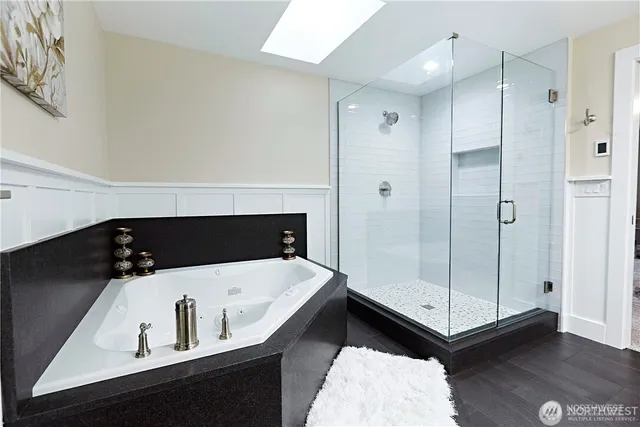 a bathroom with a sink and a shower