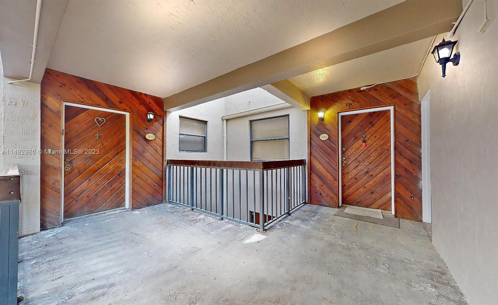 491 Ives Dairy Road, Unit 3055 Miami, FL 33179 - Photo 2 of 24 a view of livingroom with an entryway