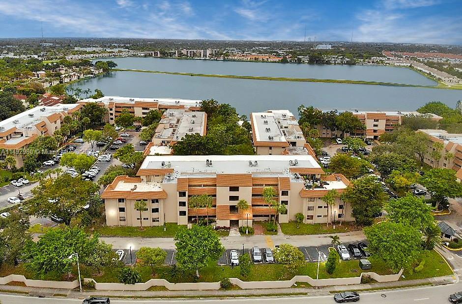 491 Ives Dairy Road, Unit 3055 Miami, FL 33179 - Photo 23 of 24 a view of a city with an ocean view