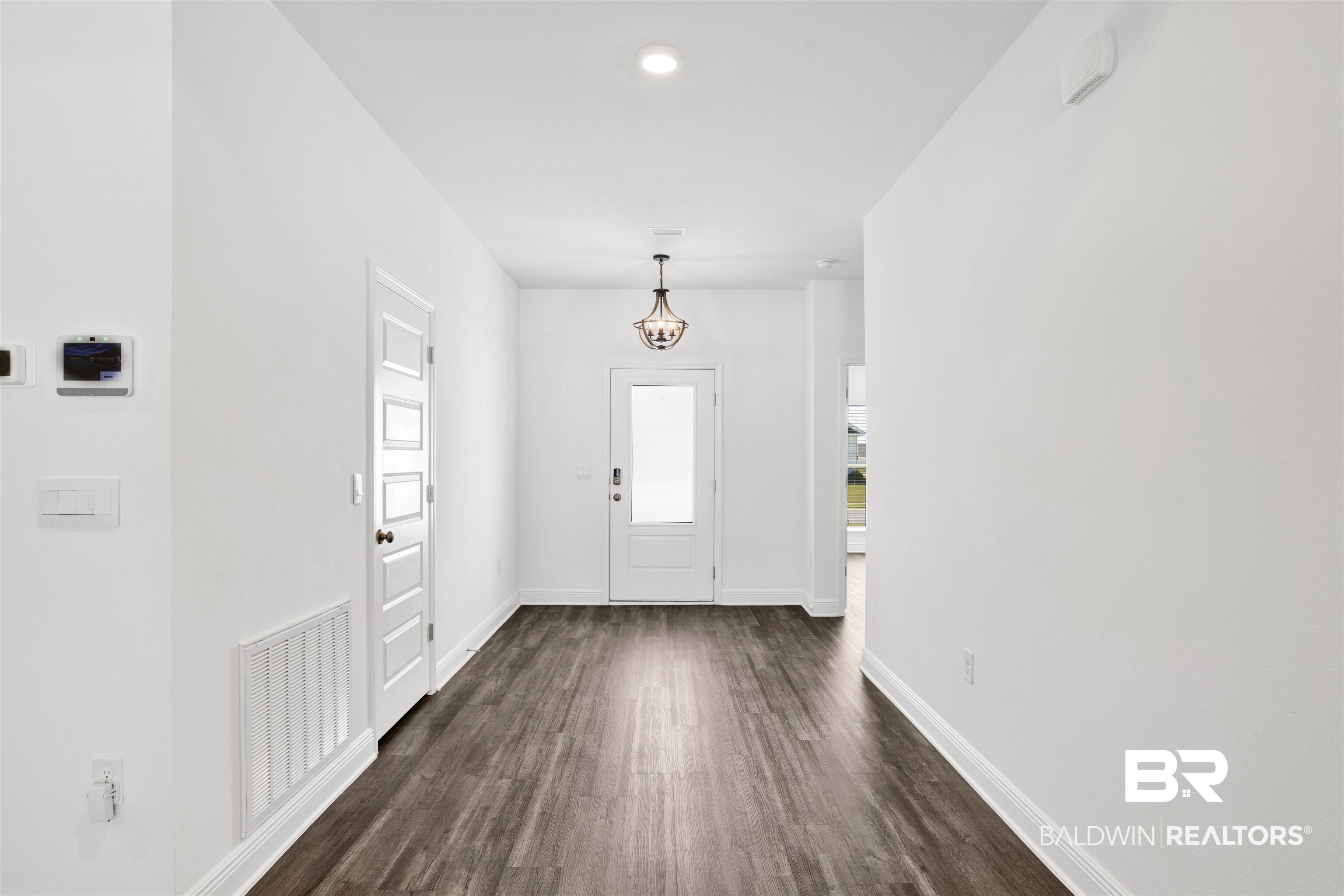 11602 Genuine Risk Circle Daphne, AL 36526 - Photo 4 of 30 Foyer entrance featuring dark wood-type flooring and recessed lighting
