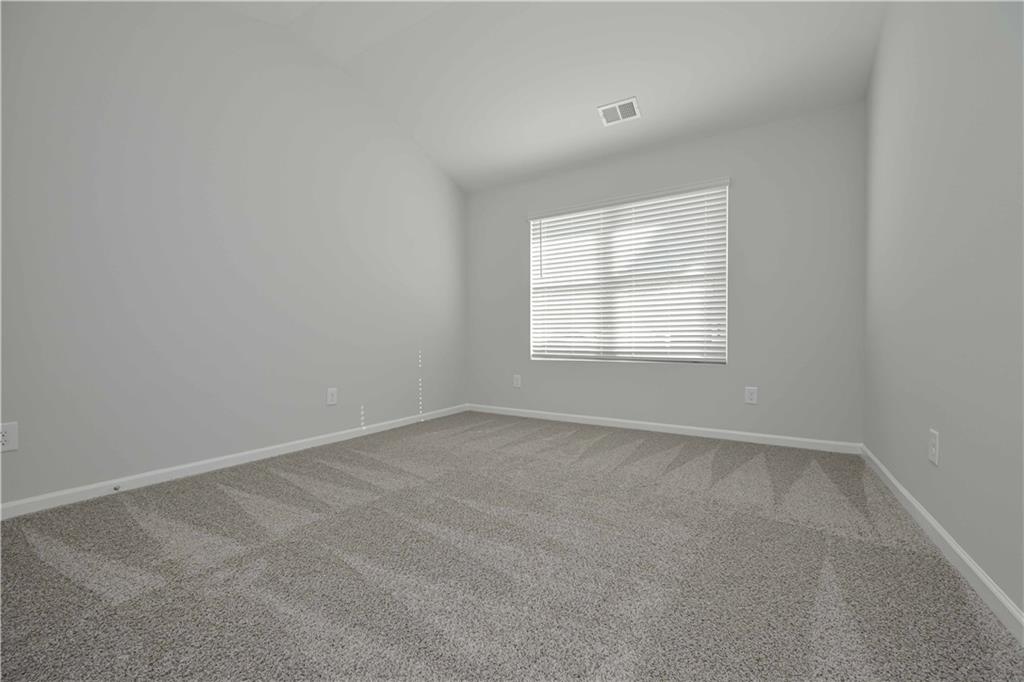 505 Charleston Place Villa Rica, GA 30180 - Photo 20 of 35 an empty room with a window