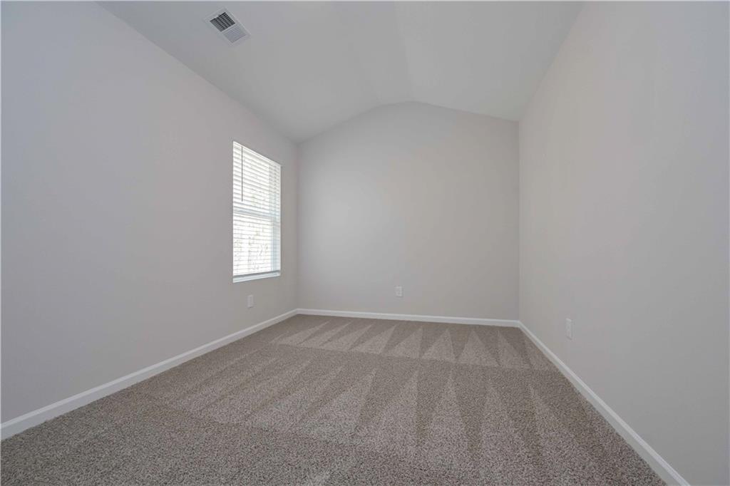 505 Charleston Place Villa Rica, GA 30180 - Photo 27 of 35 an empty room with a window
