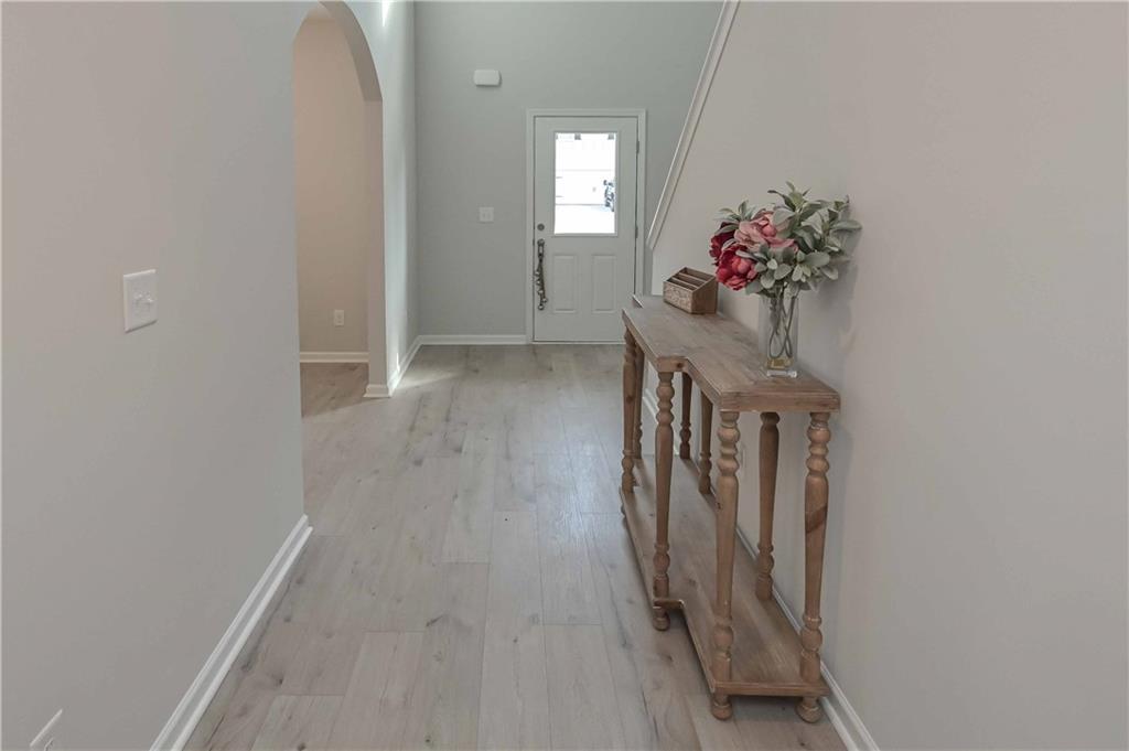 505 Charleston Place Villa Rica, GA 30180 - Photo 5 of 35 a view of a hallway with a flower pot
