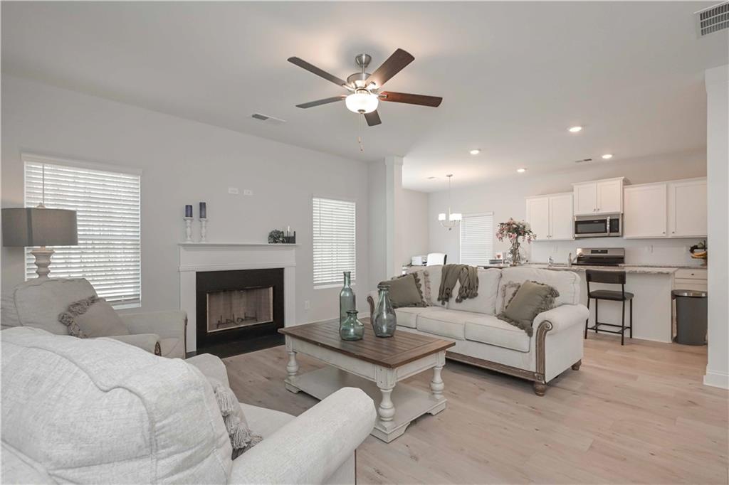 505 Charleston Place Villa Rica, GA 30180 - Photo 9 of 35 a living room with furniture and fireplace