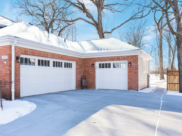 a view of a house with a garage