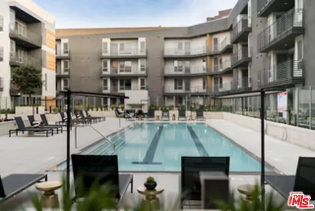 a view of a chairs and tables in the patio