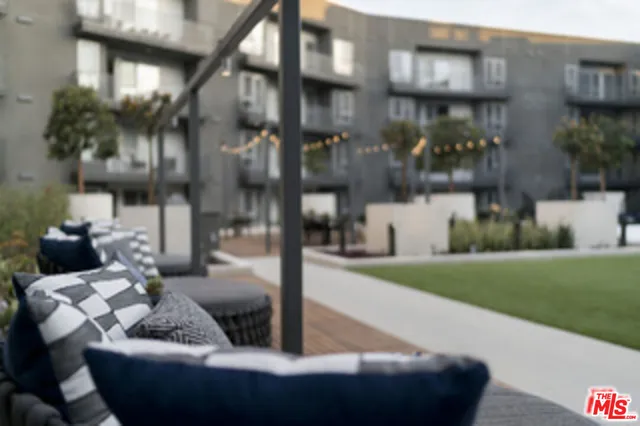 a view of dinning table and chairs in the patio