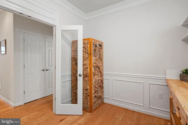 a view of an entryway with wooden floor