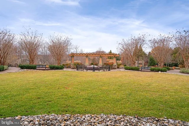 a view of a sitting area with furniture and garden
