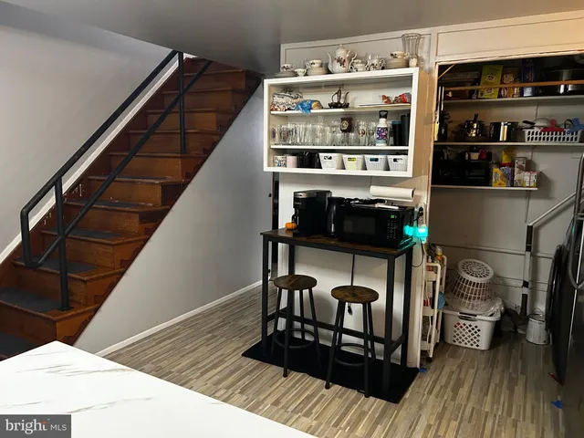 a view of workspace with wooden floor