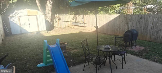 a view of a room with a table and chair