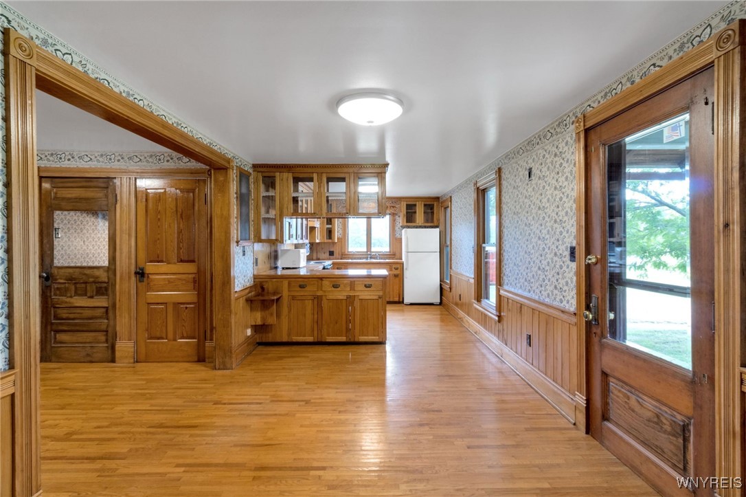 7745 Westphalinger Road Clarence, NY 14051 - Photo 13 of 50 dining area with exterior door to side porch