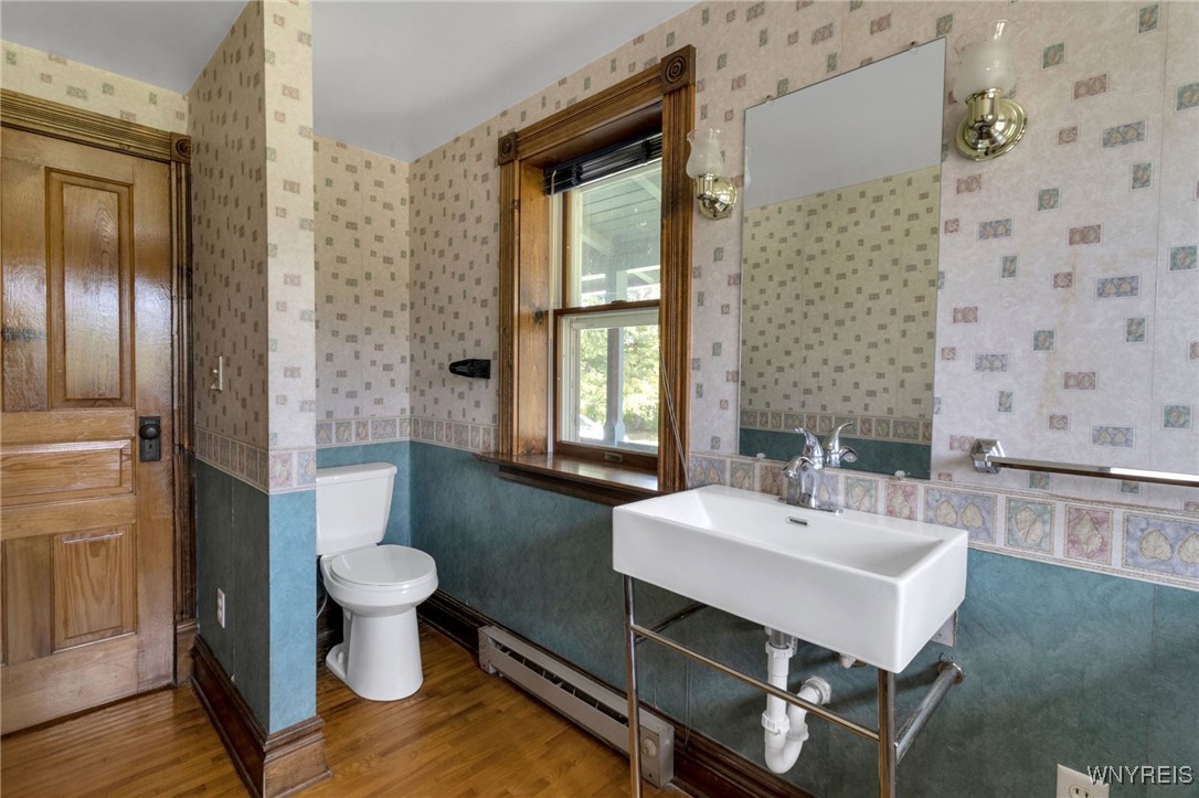 7745 Westphalinger Road Clarence, NY 14051 - Photo 19 of 50 first floor half bath and laundry room