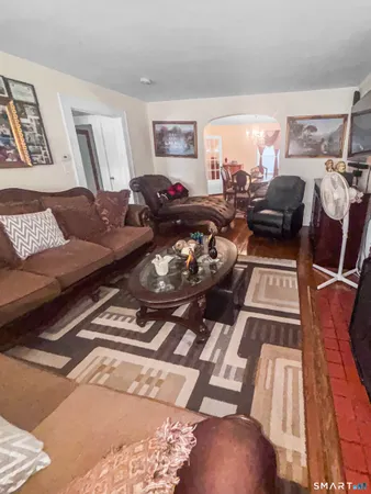 a living room with furniture and a couch