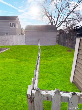 a view of a backyard with a garden