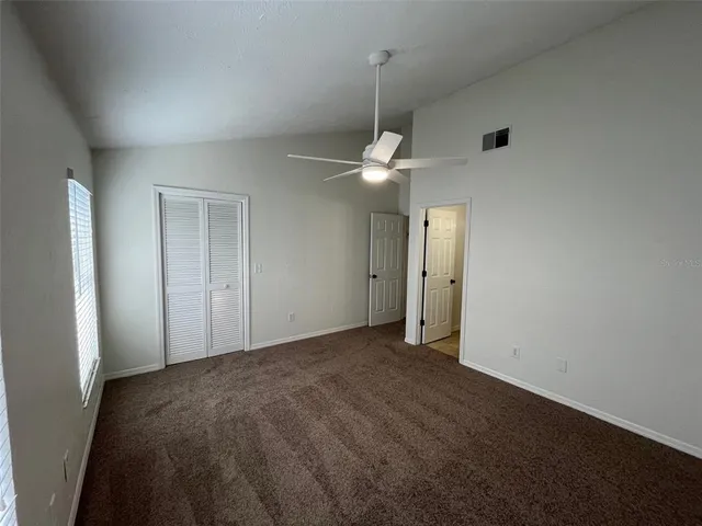 an empty room with a bathroom