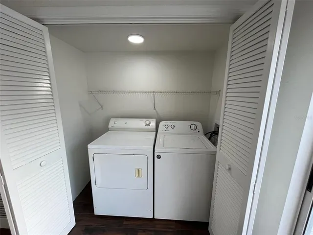 a utility room with dryer and washer