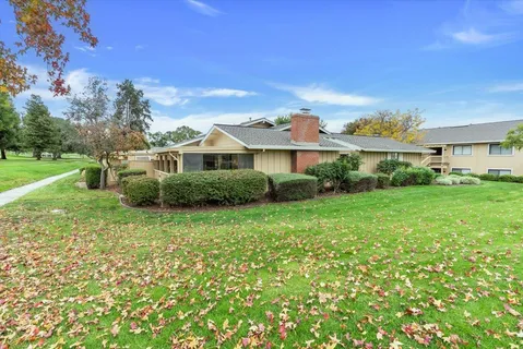 a view of a house with a big yard