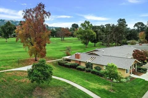 a view of a garden with an outdoor space