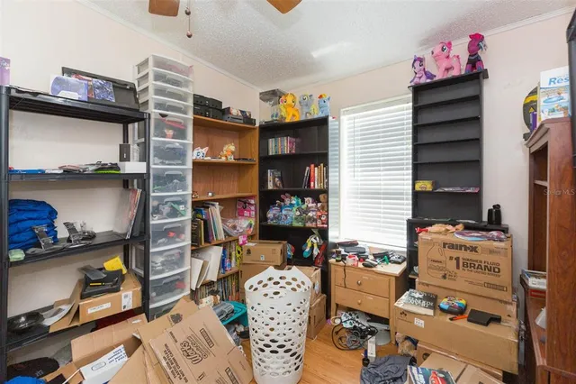 a bedroom with furniture and a closet