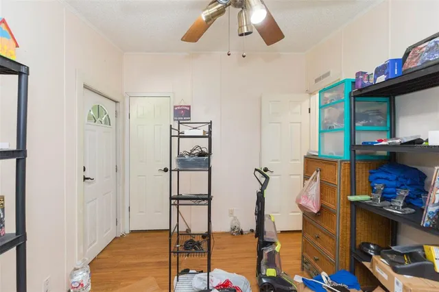 a bathroom with a window and a shower