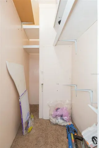 a room with furniture and a flat screen tv