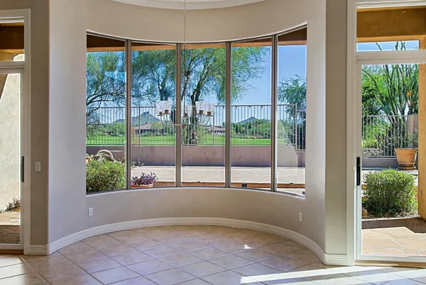 a view of a room with a large window