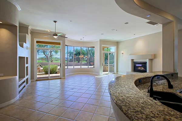 a view of a livingroom with furniture wooden floor and a rug