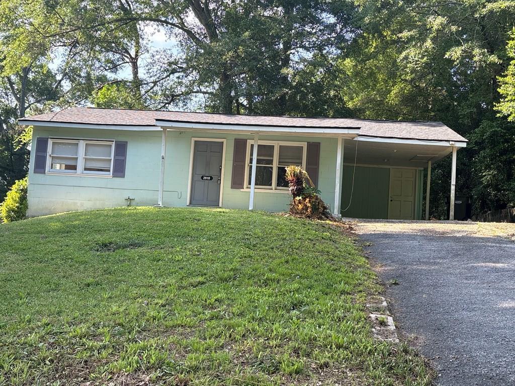 2910 Beech Street Columbus, GA 31909 - Photo 2 of 24 a view of a house with yard and garden