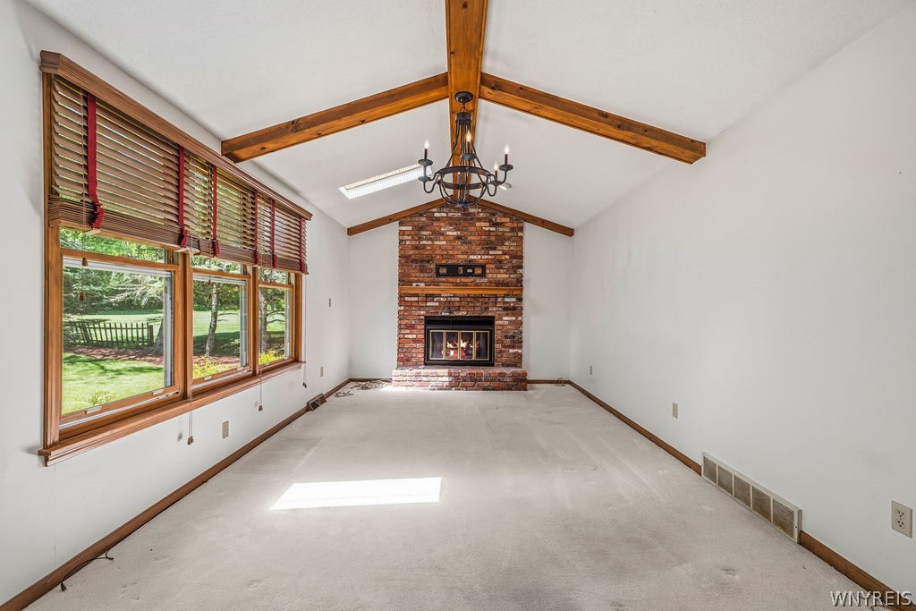 5788 Stone Road Lockport, NY 14094 - Photo 6 of 38 Enormous family room with gas fireplace