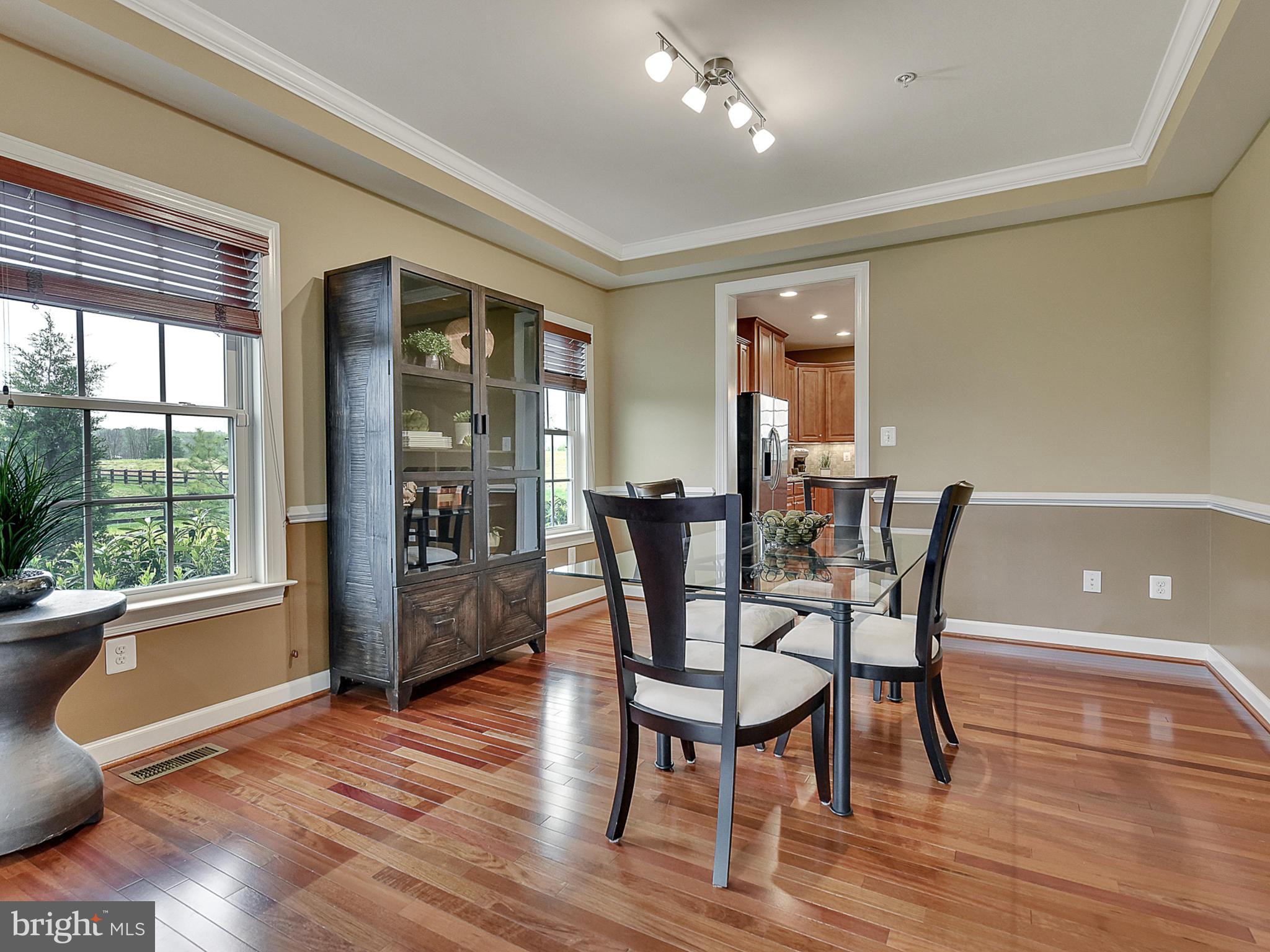 9176 Bealls Farm Road Frederick, MD 21704 - Photo 5 of 73 Formal dining room with chair rail.