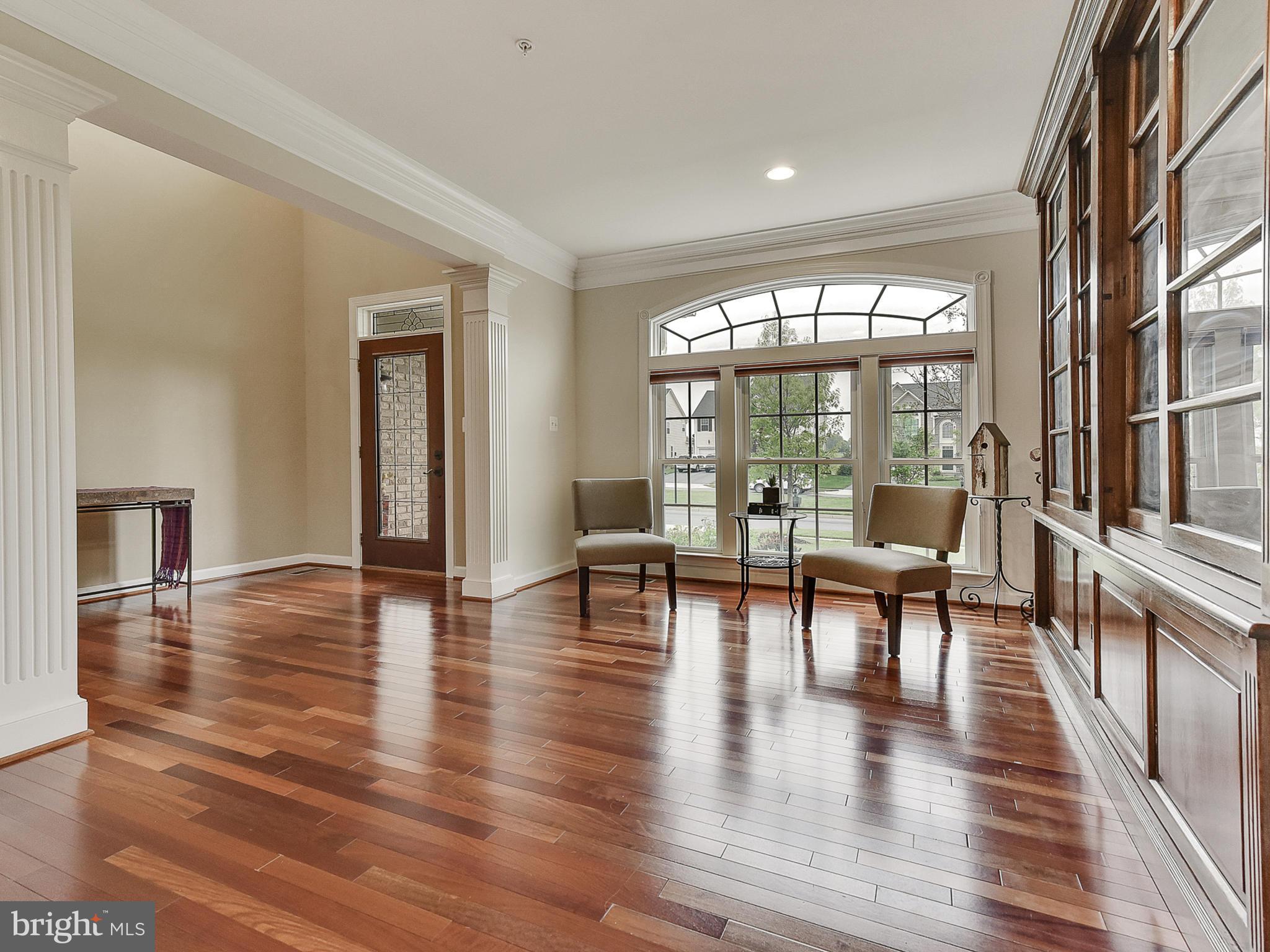 9176 Bealls Farm Road Frederick, MD 21704 - Photo 6 of 73 Light-filled living room with gleaming hardwoods.