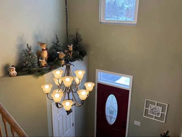 a bathroom with a sink mirror and vanity