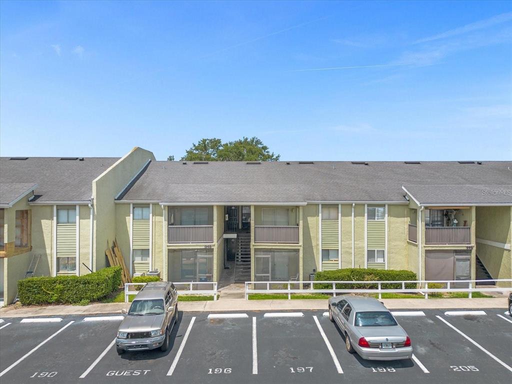 906 Lake Destiny Road, Unit E Altamonte Springs, FL 32714 - Photo 1 of 1 a car parked in front of a house