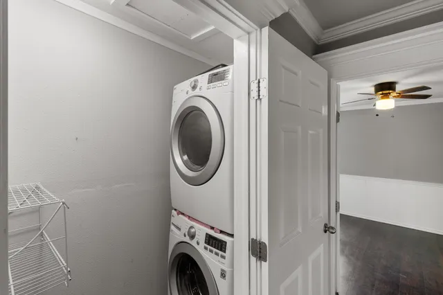 a view of a hallway with washer and dryer