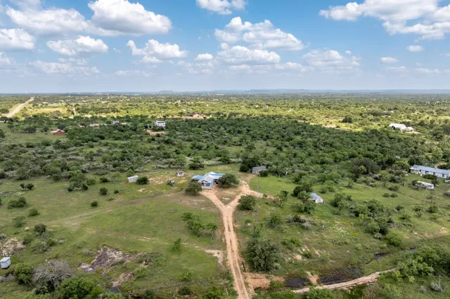 a view of a yard with an outdoor space