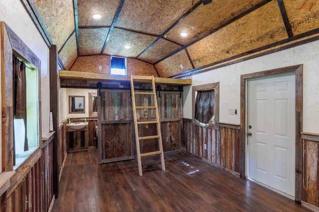 a view of livingroom with furniture and wooden floor
