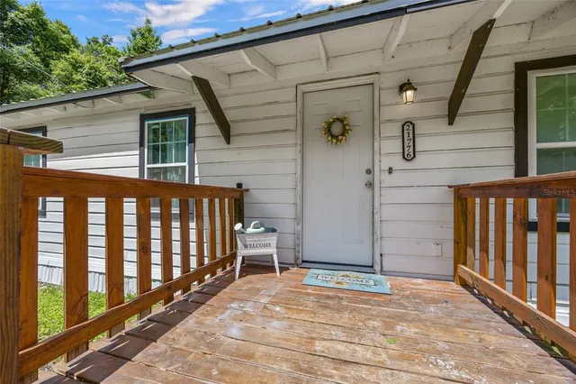 a front view of a house with a balcony