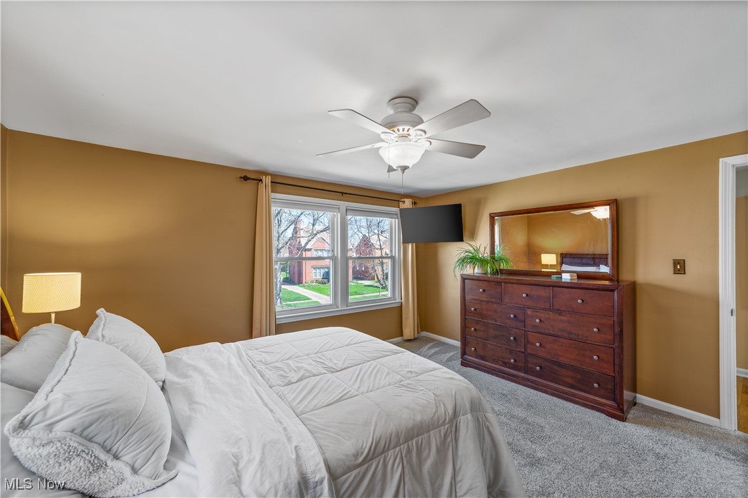 3826 Faversham Road Cleveland, OH 44118 - Photo 14 of 40 Bedroom featuring carpet floors, a ceiling fan, and baseboards