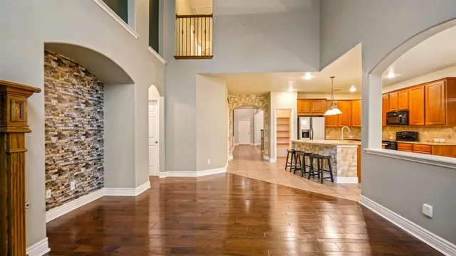 a view of a living room with a large window