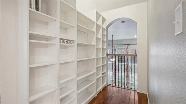 a view of a room with racks on the wall