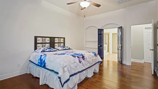 a spacious bathroom with a double vanity sink shower and a mirror