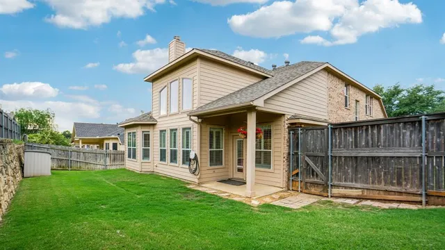 a view of a backyard with a garden