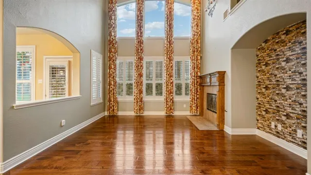 a view of an entryway with wooden floor