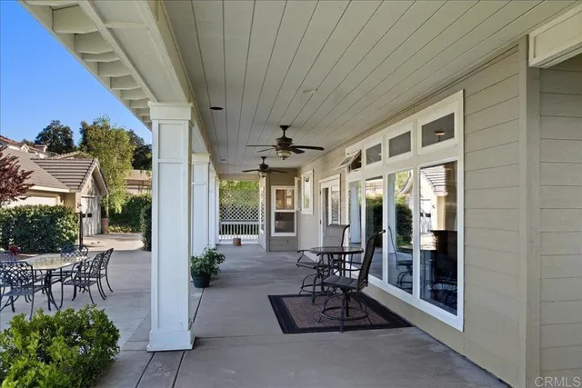 a lobby with furniture and potted plant