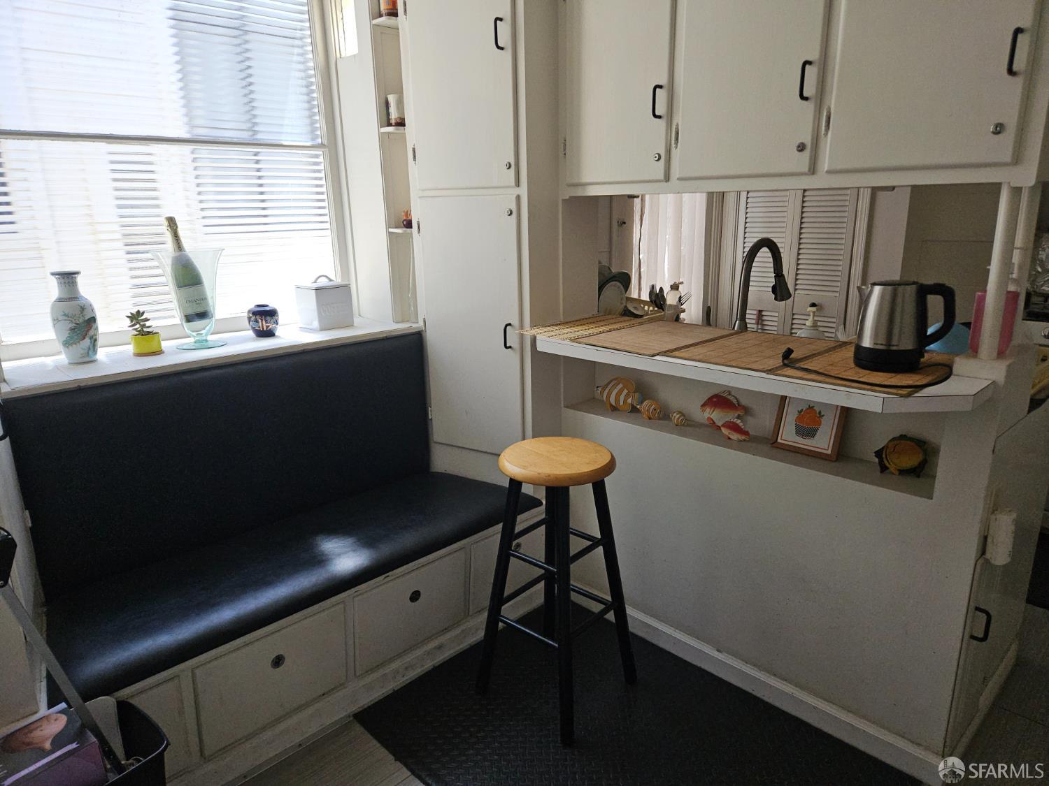841-845 Fulton Street San Francisco, CA 94117 - Photo 18 of 32 a kitchen with stainless steel appliances a stove a sink and a refrigerator