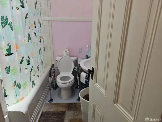 a bathroom with a sink and toilet