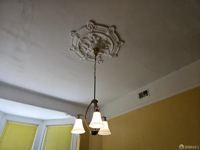 a vase of flowers sitting on a table